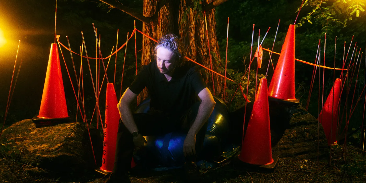 "Oneohtrix Point Never Illuminates Audiences with 'A Barely Lit Path'"